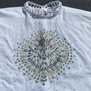 FREE PEOPLE gorgeous blouse of tasteful bling!